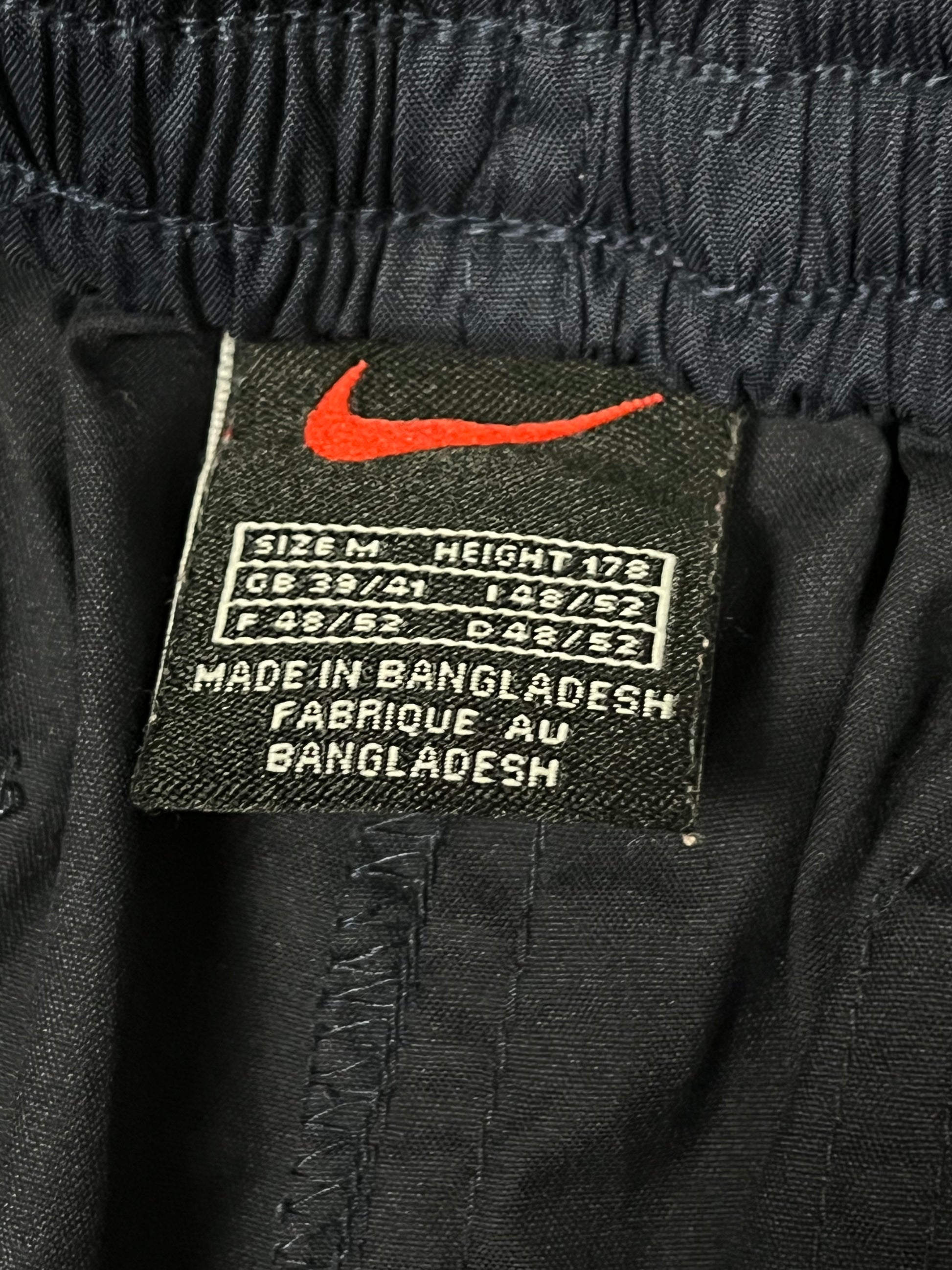 vintage Nike trackpants {M}