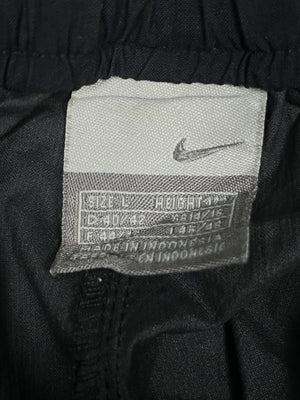 vintage Nike trackpants {S}