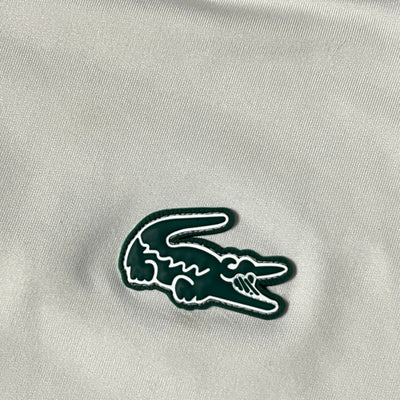 white Lacoste trackjacket {L}