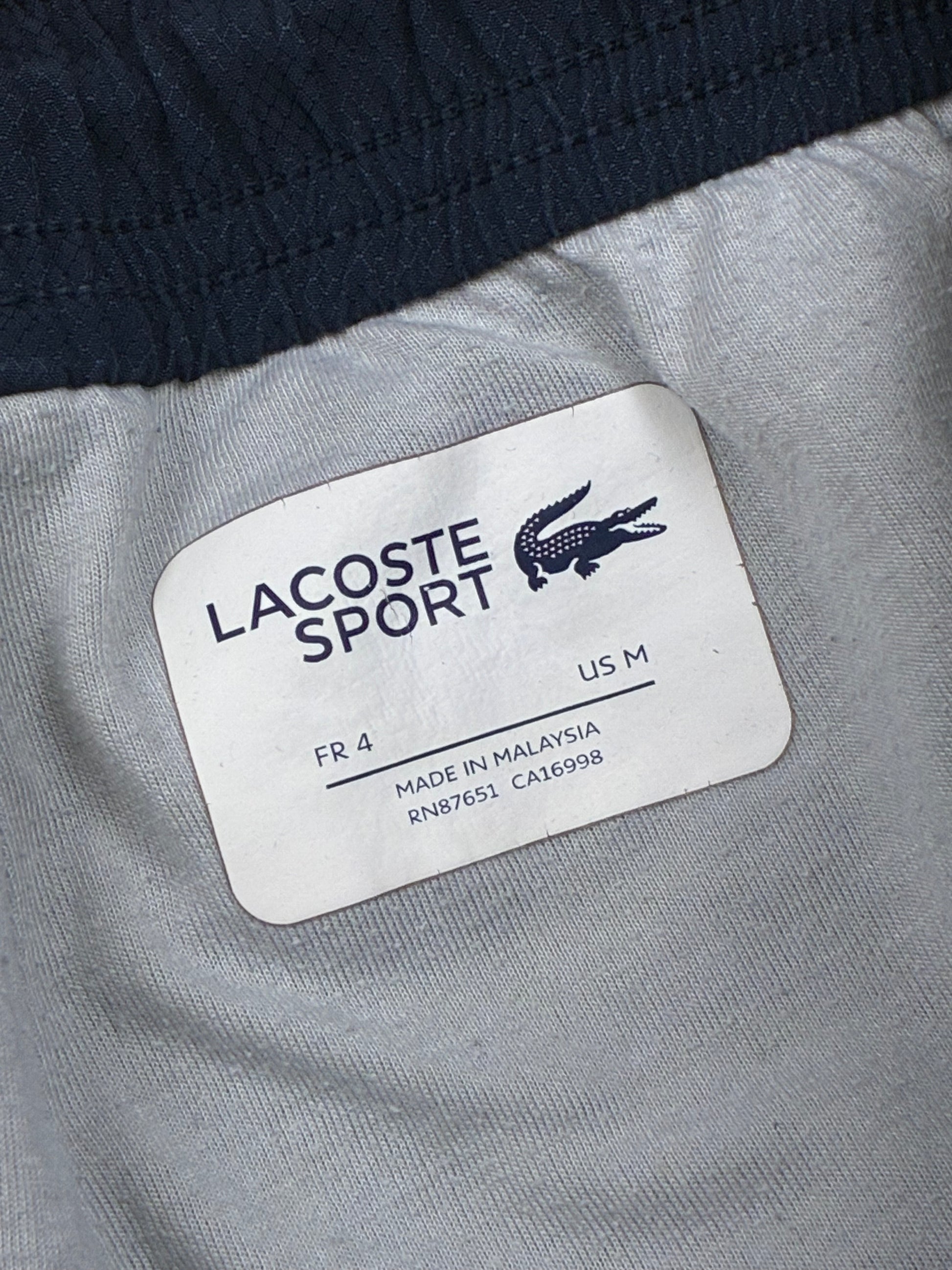 navyblue Lacoste trackpants {M}
