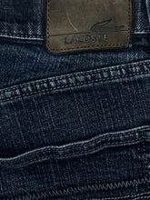 Load image into Gallery viewer, vintage Lacoste jeans {M}
