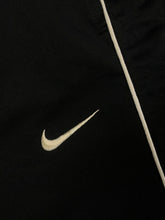 Carregar imagem no visualizador da galeria, vintage Nike button joggingpants {XL}
