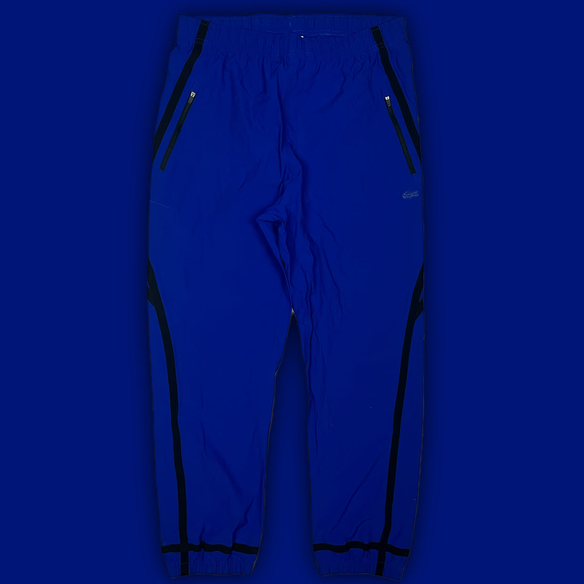 blue Lacoste trackpants {M}