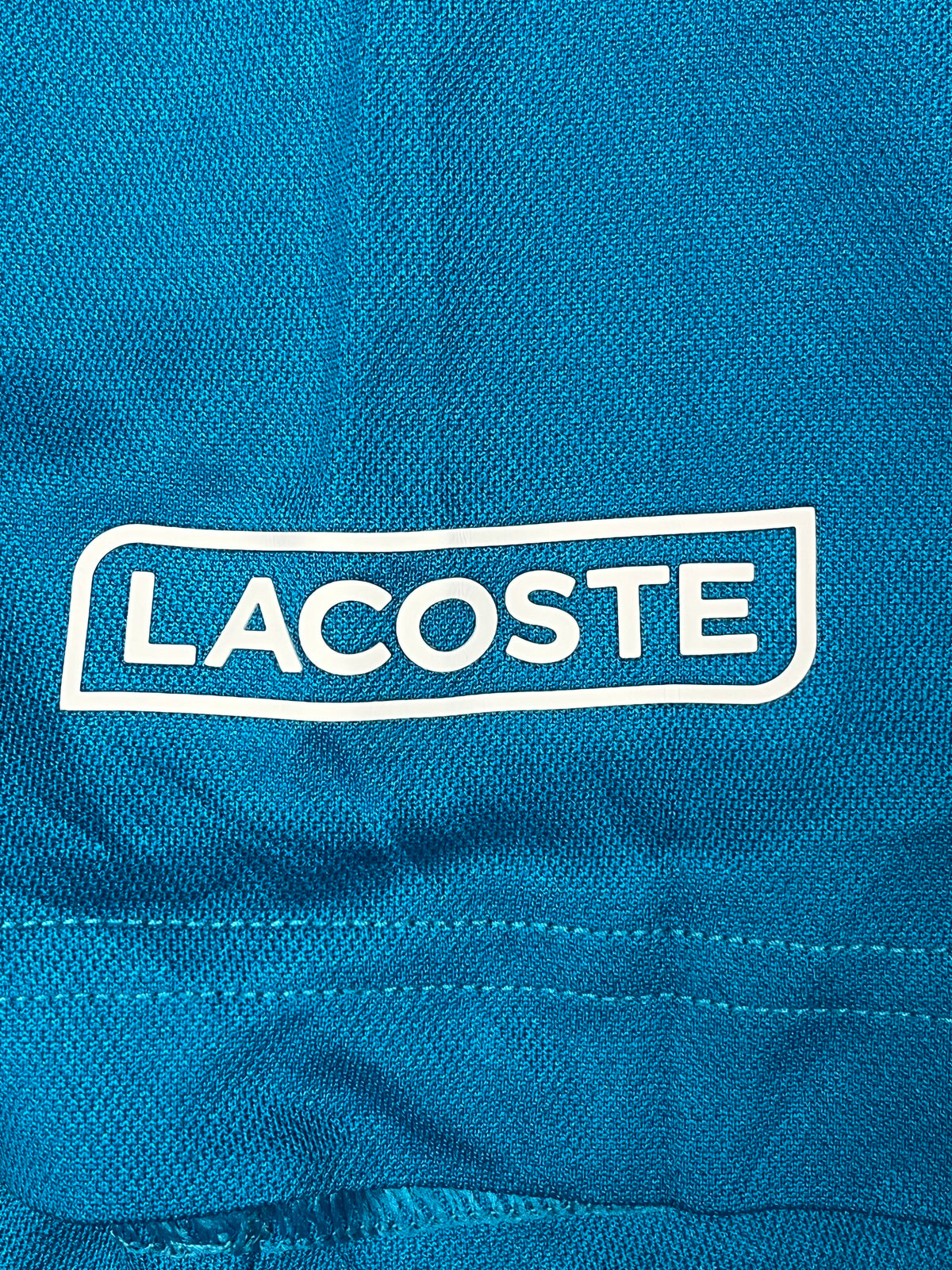 turquoise Lacoste jersey {S}