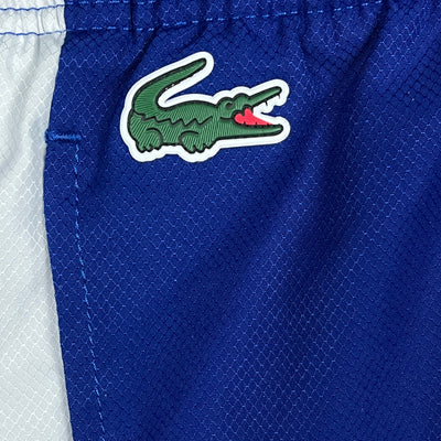 blue Lacoste trackpants {S}