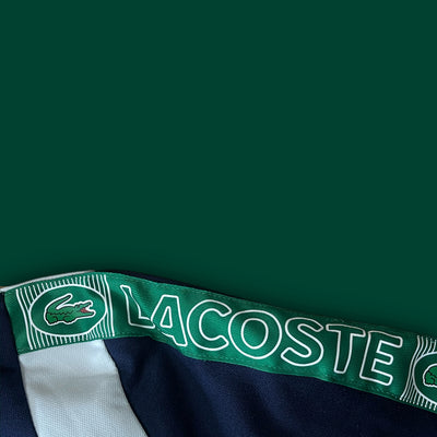 white Lacoste trackjacket {M}