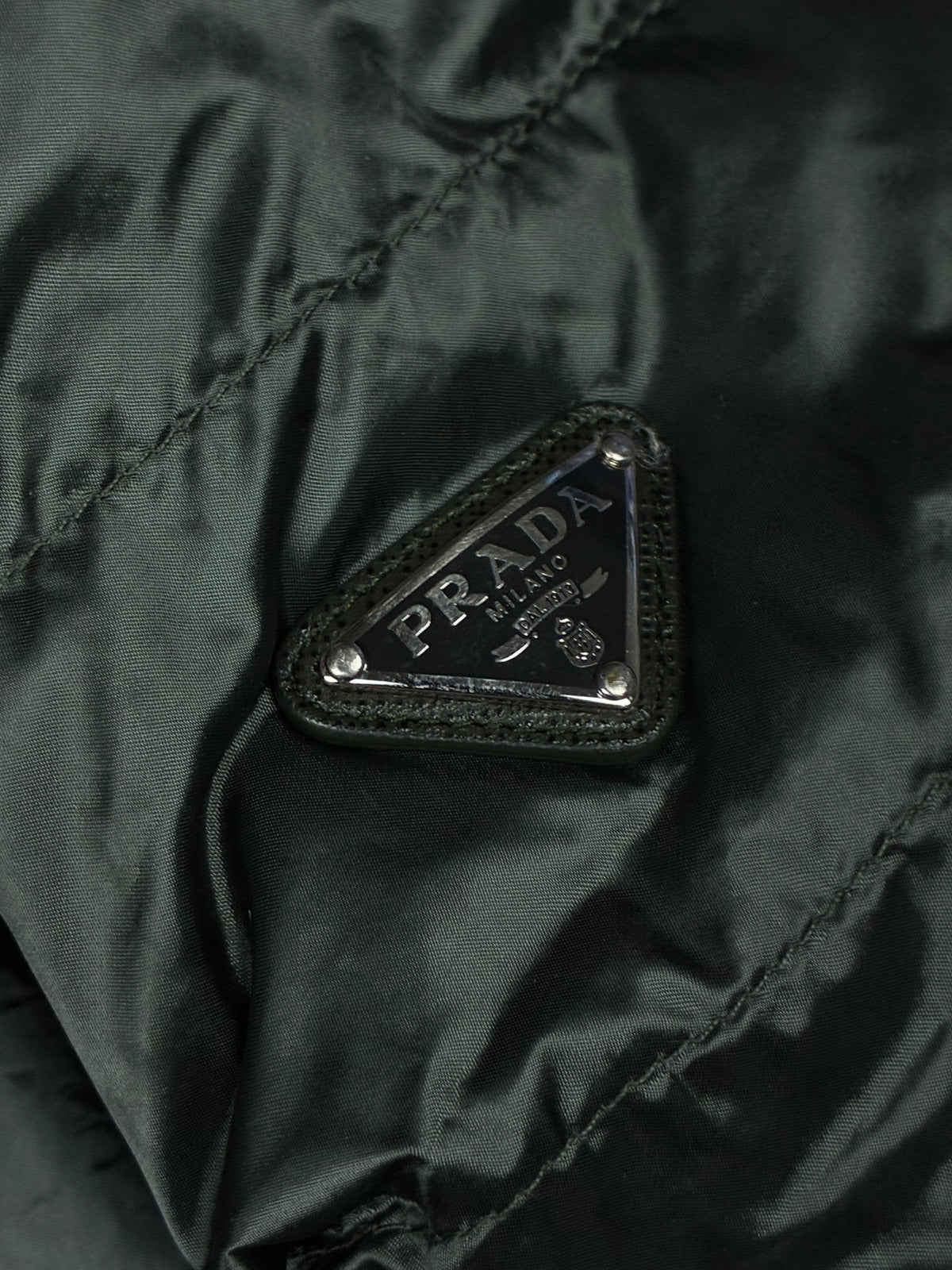 dark green Prada pufferjacket {XS}