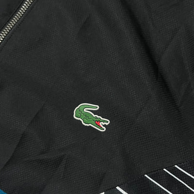 turquoise Lacoste windbreaker {L}