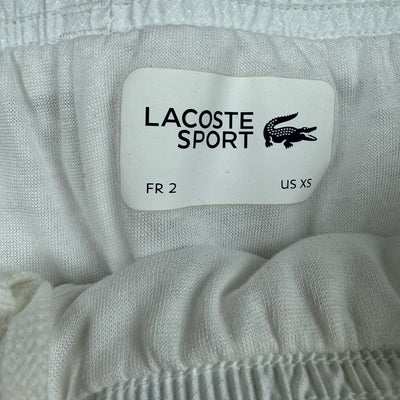 white Lacoste trackpants {XS}