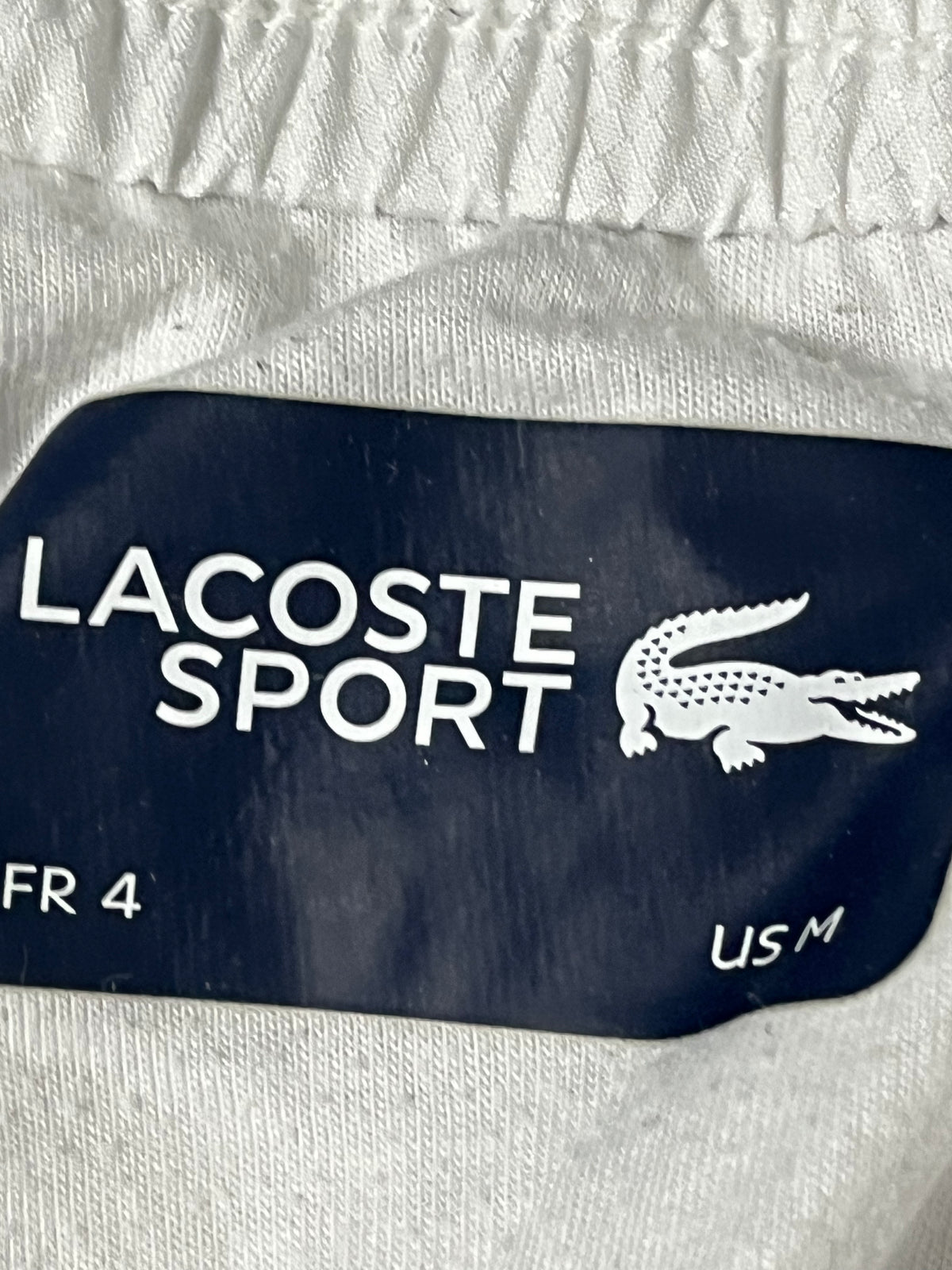 white/black Lacoste trackpants {L}