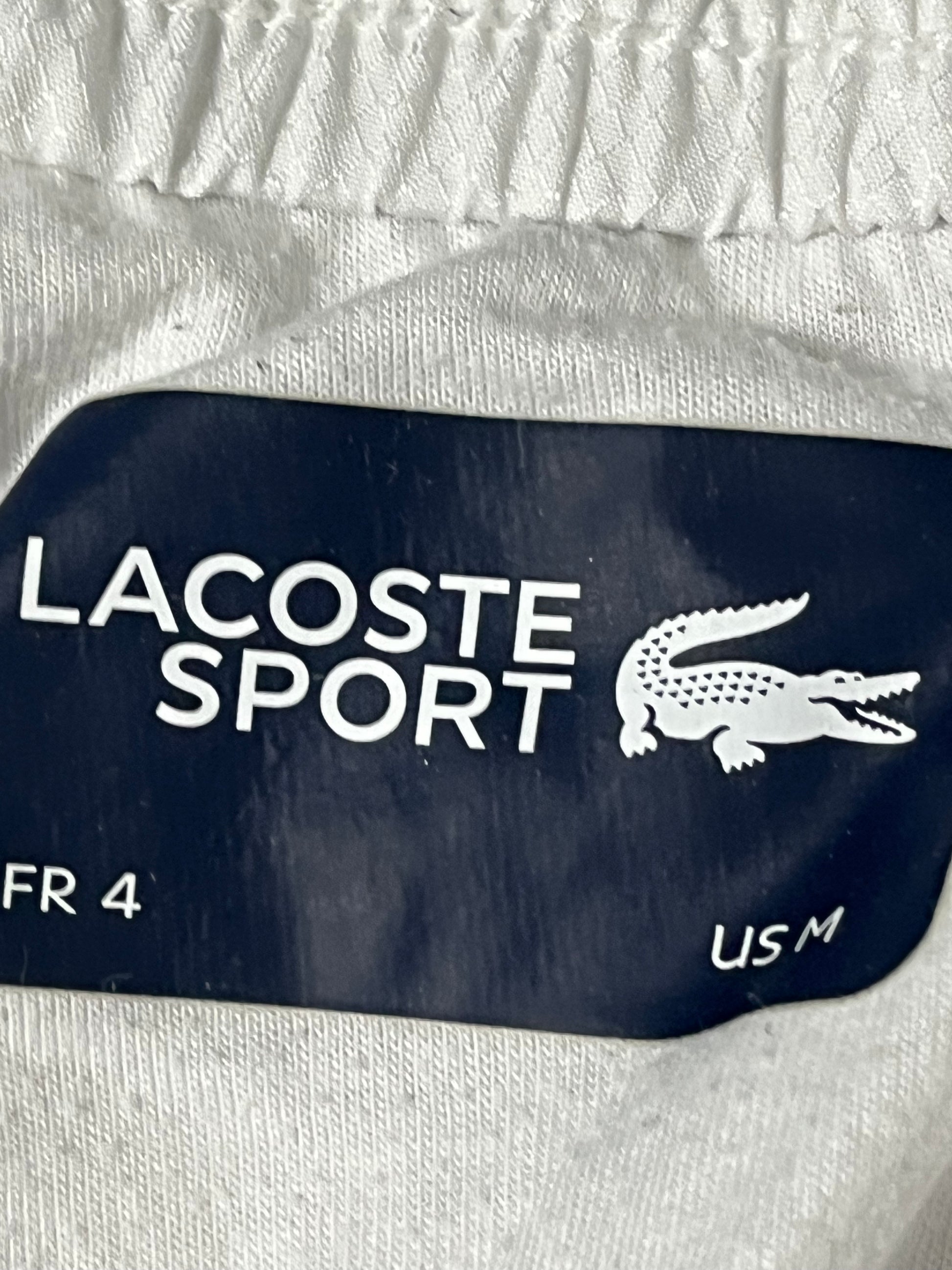 white/black Lacoste trackpants {L}