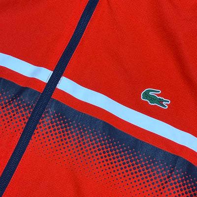 orange Lacoste windbreaker {S}