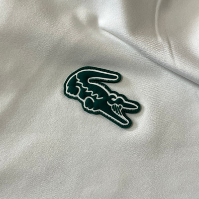 white Lacoste trackjacket {XL}