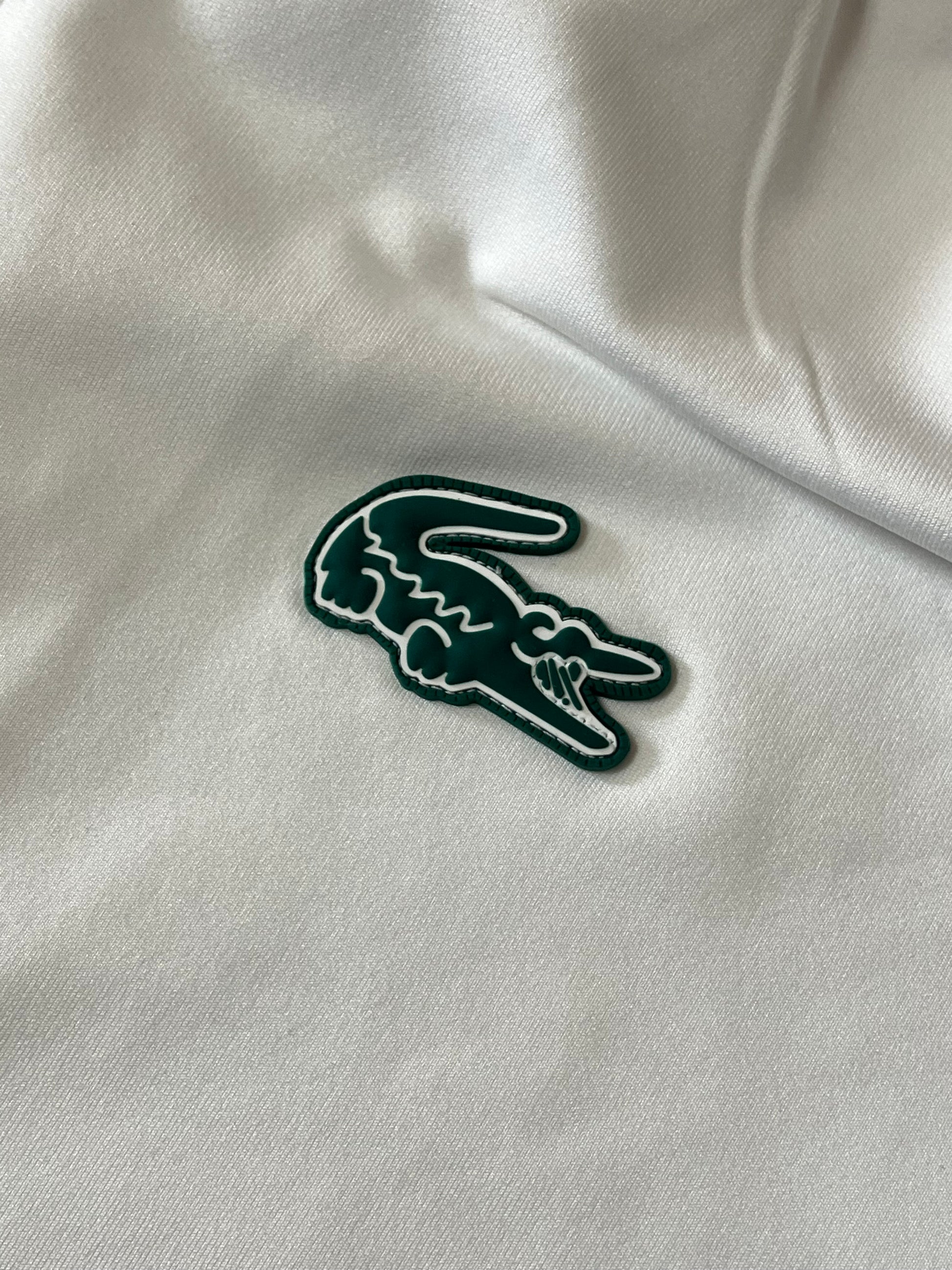 white Lacoste trackjacket {XL}