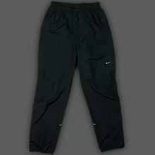 Load image into Gallery viewer, vintage Nike trackpants {M}
