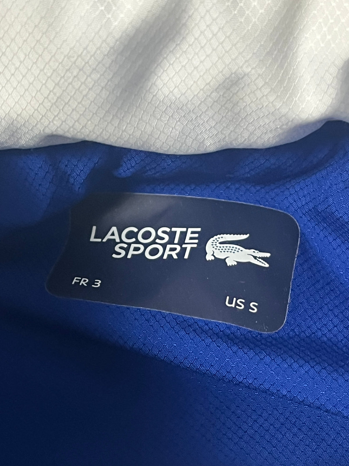 blue Lacoste windbreaker {M}