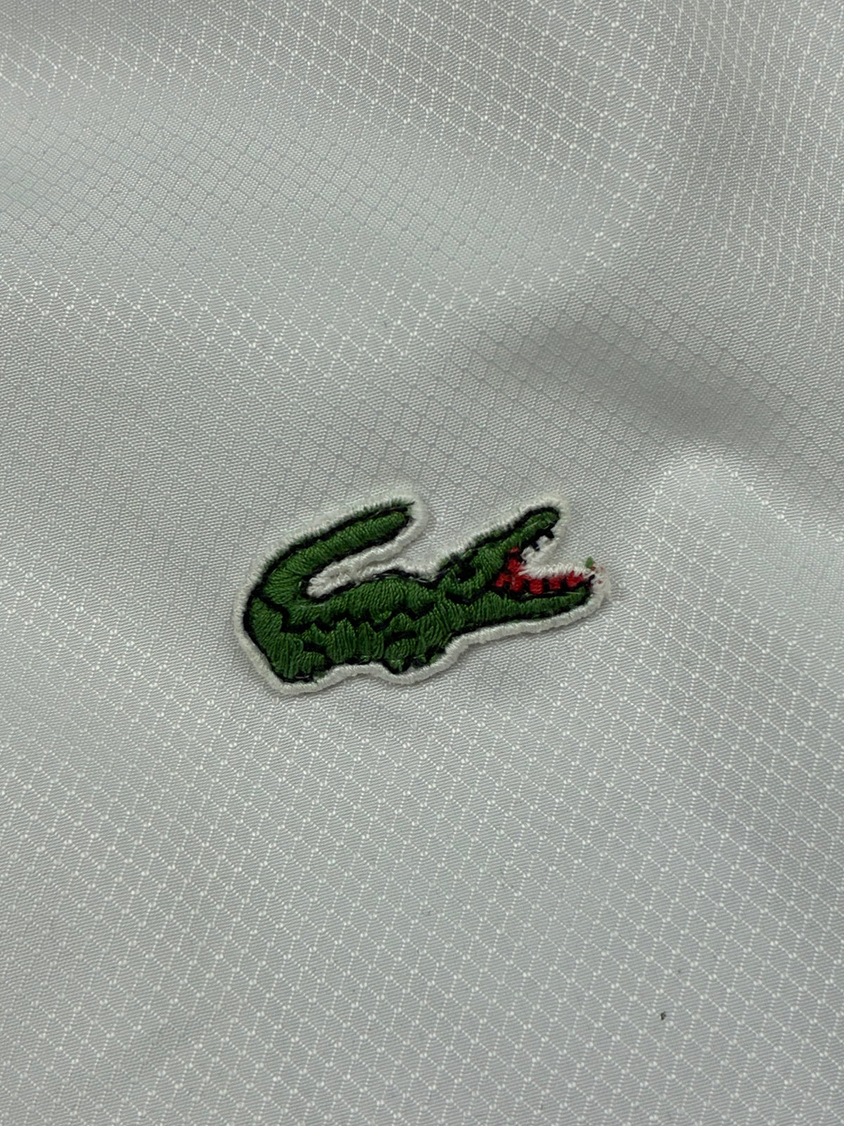 vintage Lacoste windbreaker {L}