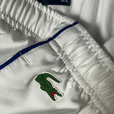 white Lacoste trackpants {XL}