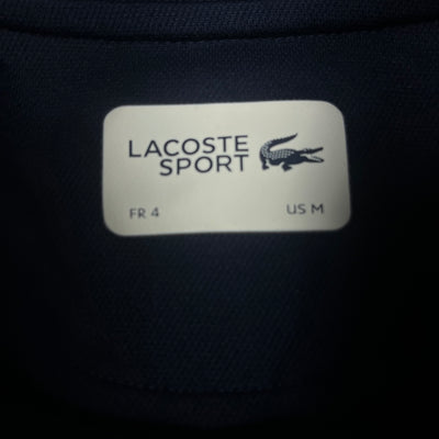 red Lacoste trackjacket {M}