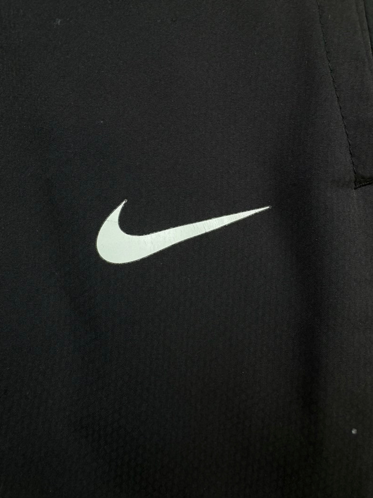 vintage Nike Manchester United trackpants {S}