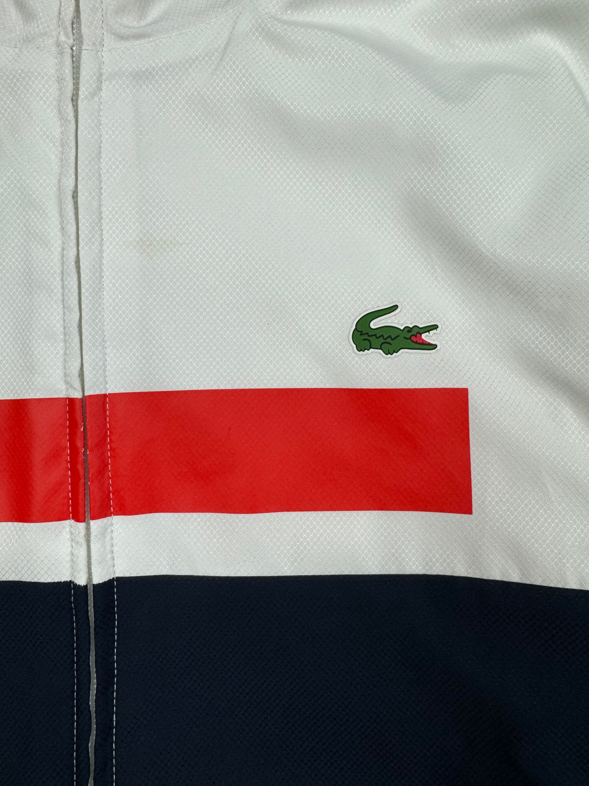 white Lacoste windbreaker {S}