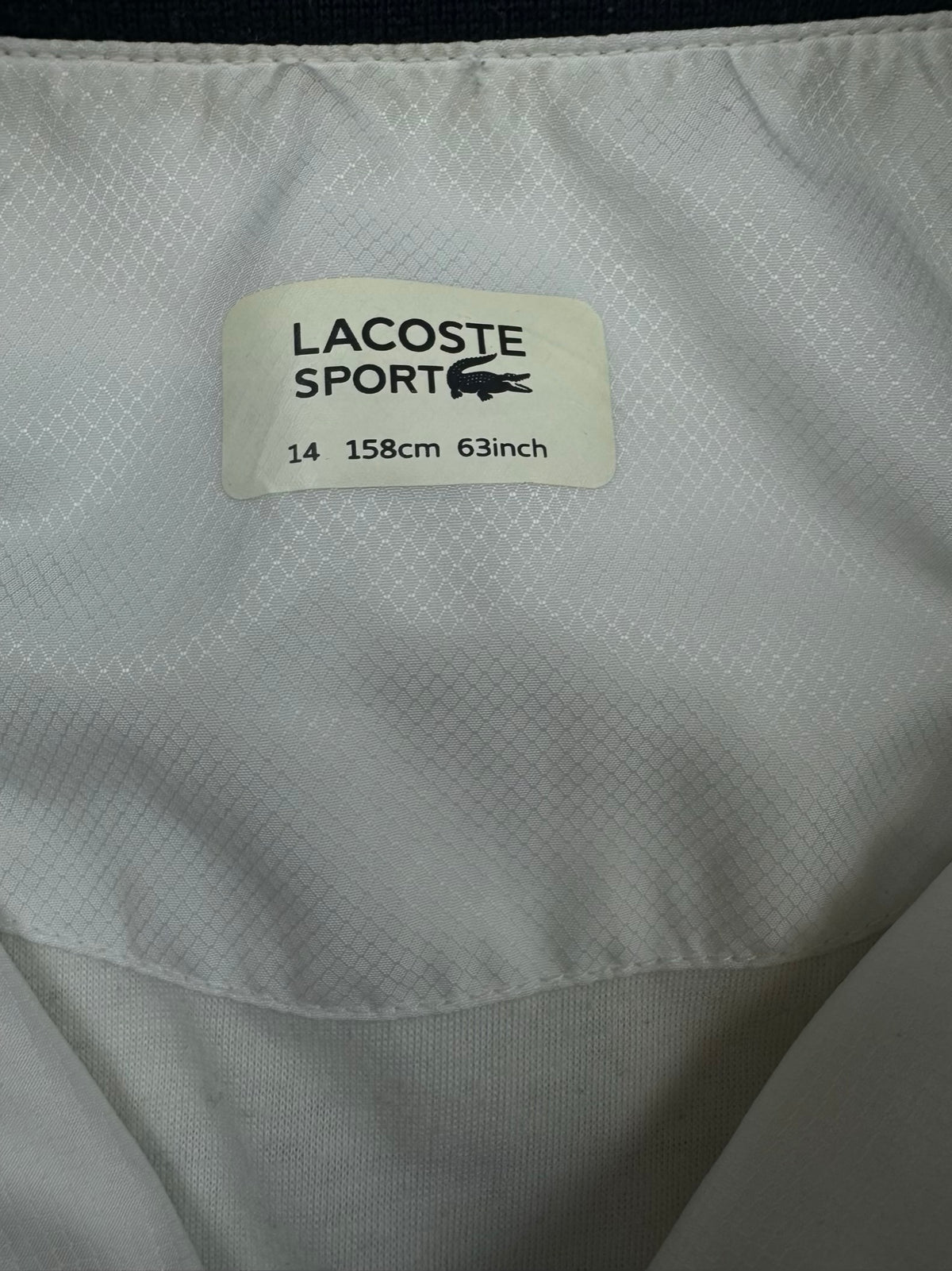 blue Lacoste windbreaker {XS}