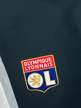 Load image into Gallery viewer, vintage Umbro Olympique Lyon trackpants {XL}

