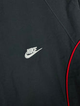 Load image into Gallery viewer, vintage Nike trackpants {XL}
