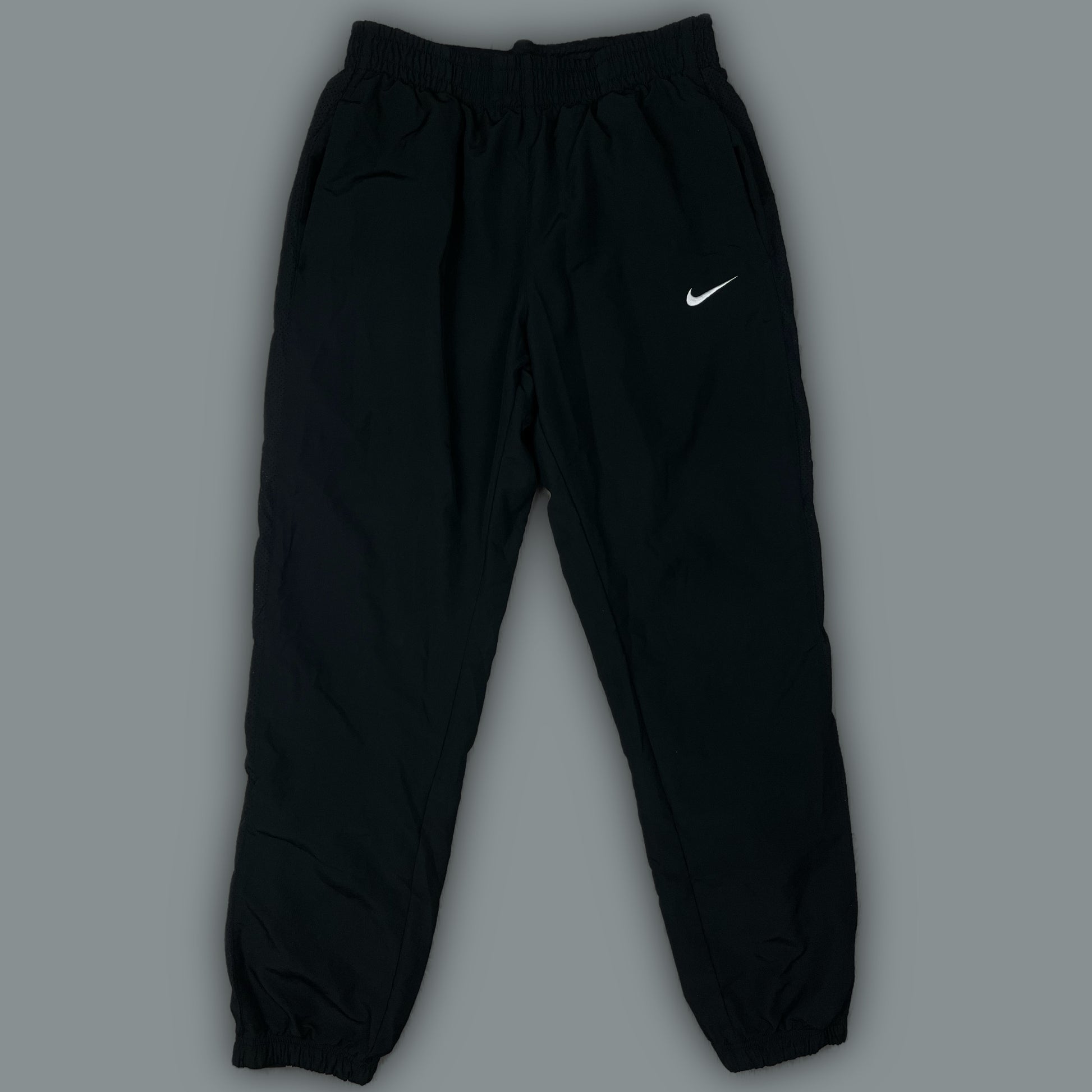 vintage Nike trackpants {M}