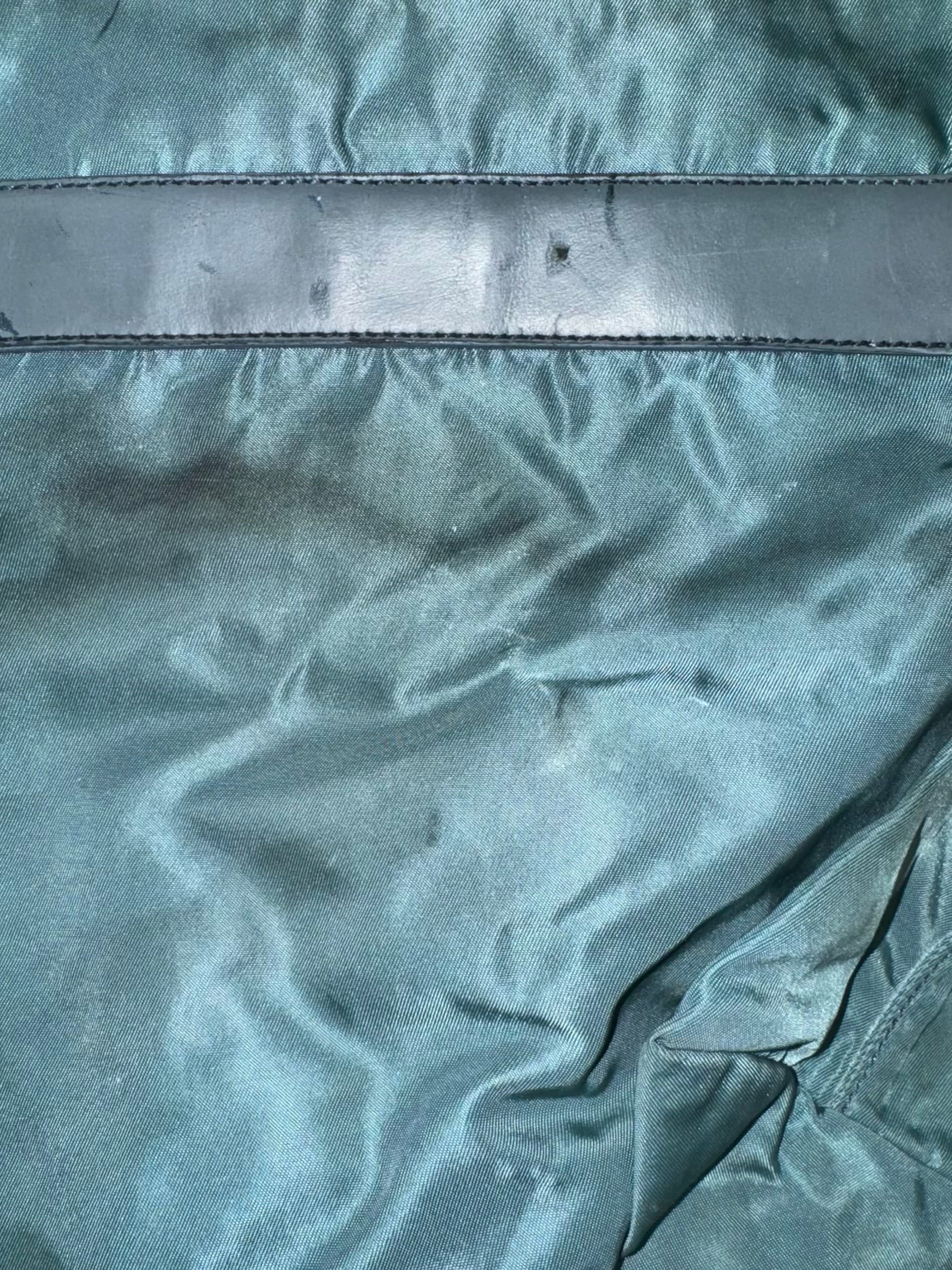vintage turquoise Prada slingbag
