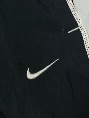 vintage Nike trackpants {L}