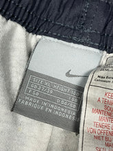 Load image into Gallery viewer, vintage Nike trackpants {XL}
