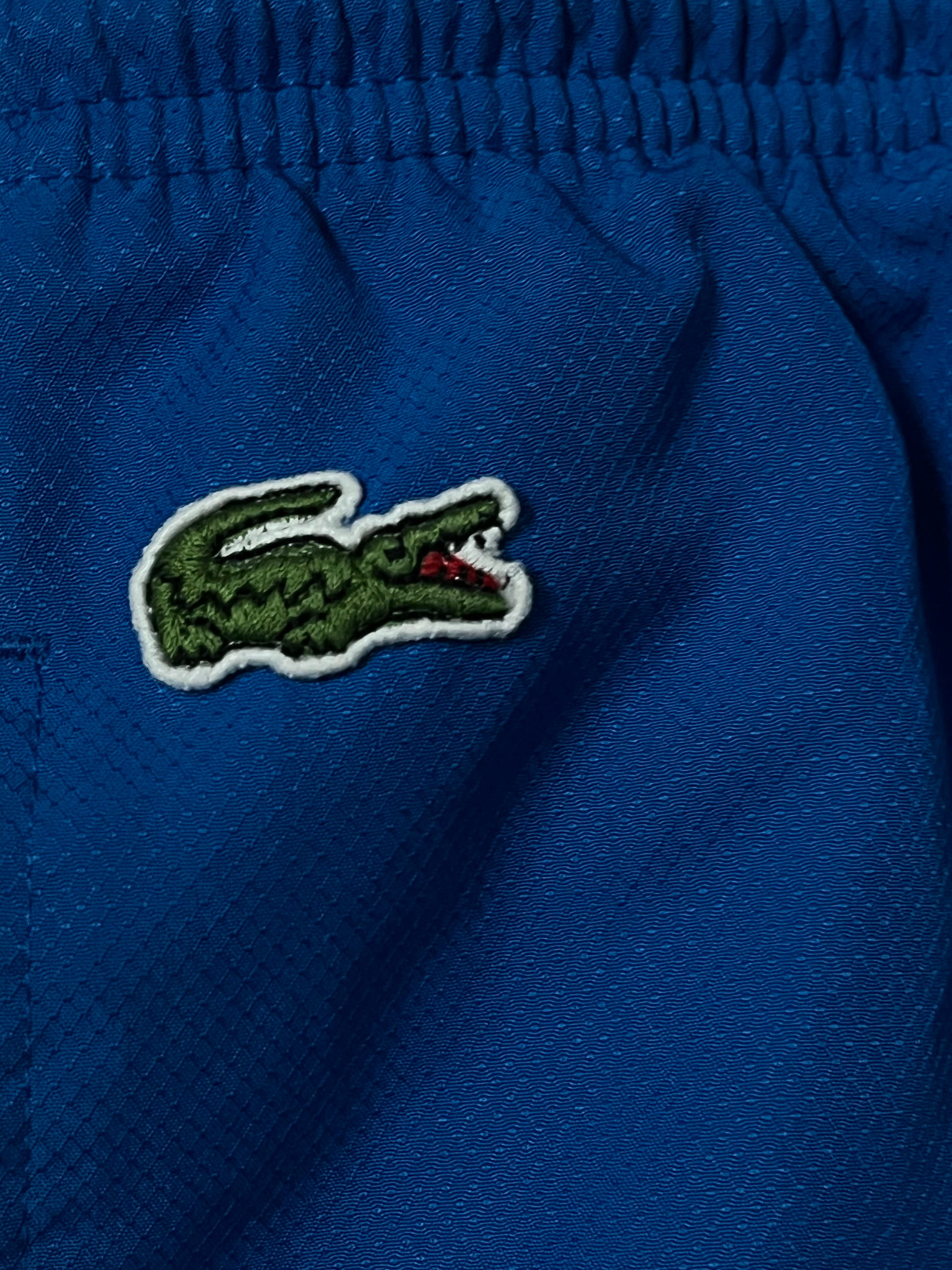 vintage Lacoste trackpants {L}