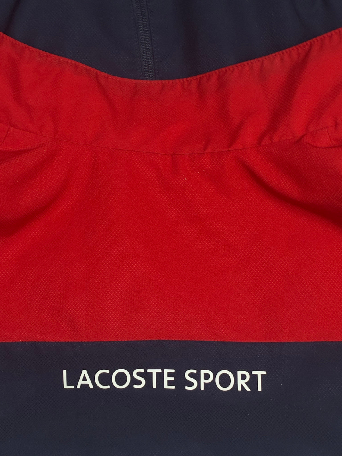 red Lacoste windbreaker {S}