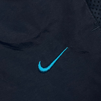 vintage Nike trackpants {M}