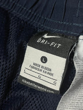 Carregar imagem no visualizador da galeria, vintage Nike trackpants {L}
