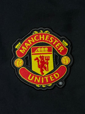 vintage Nike Manchester United trackpants {M}