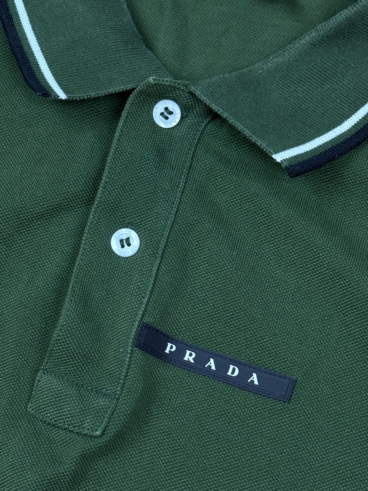 dark green Prada polo