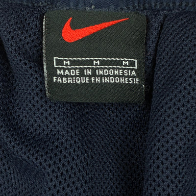 vintage Nike trackpants {M}