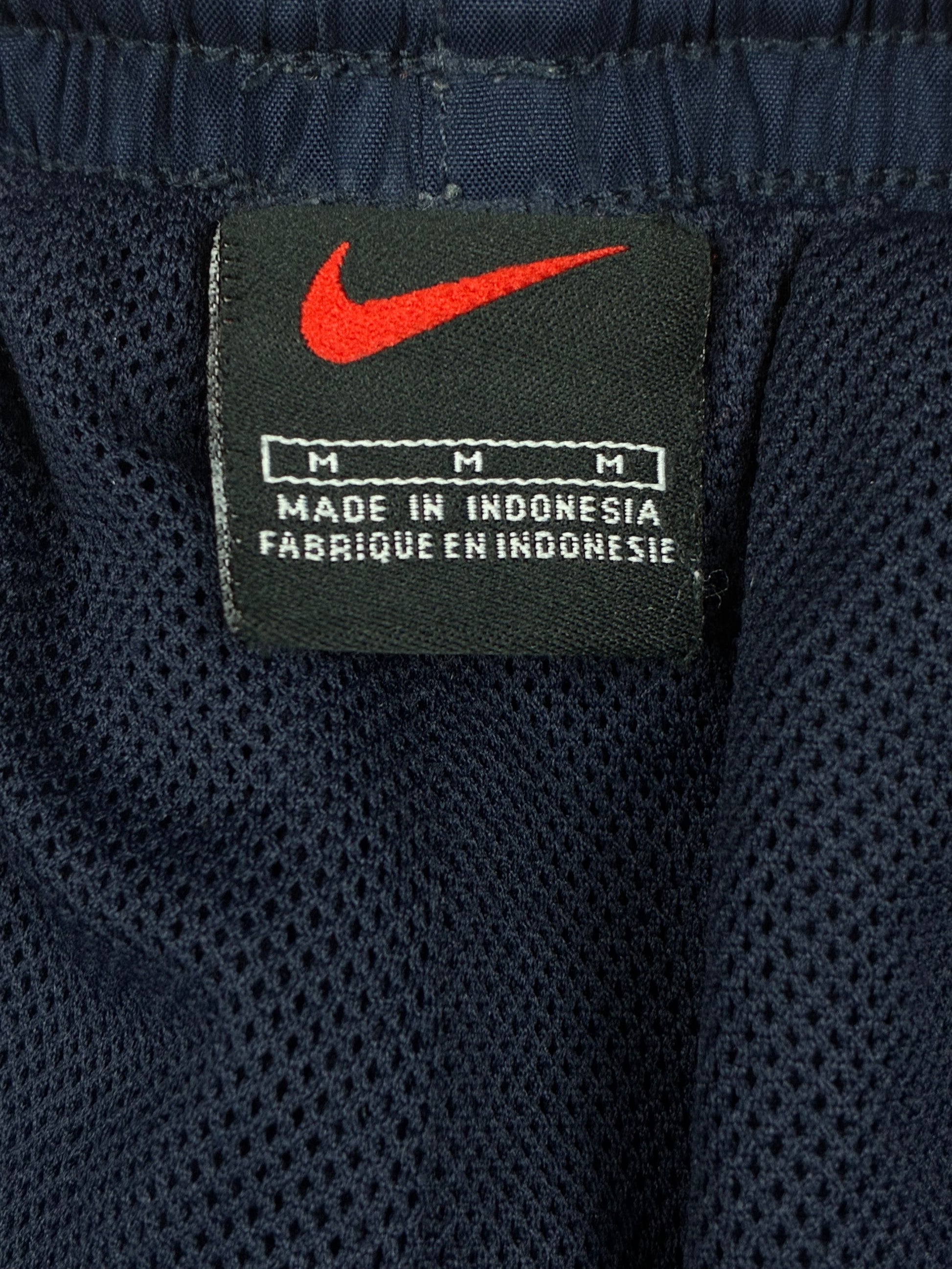 vintage Nike trackpants {M}