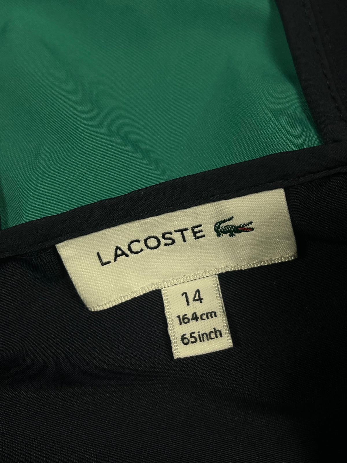 turquoise Lacoste windbreaker {XS}