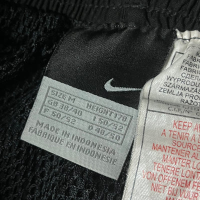 vintage Nike trackpants {M}