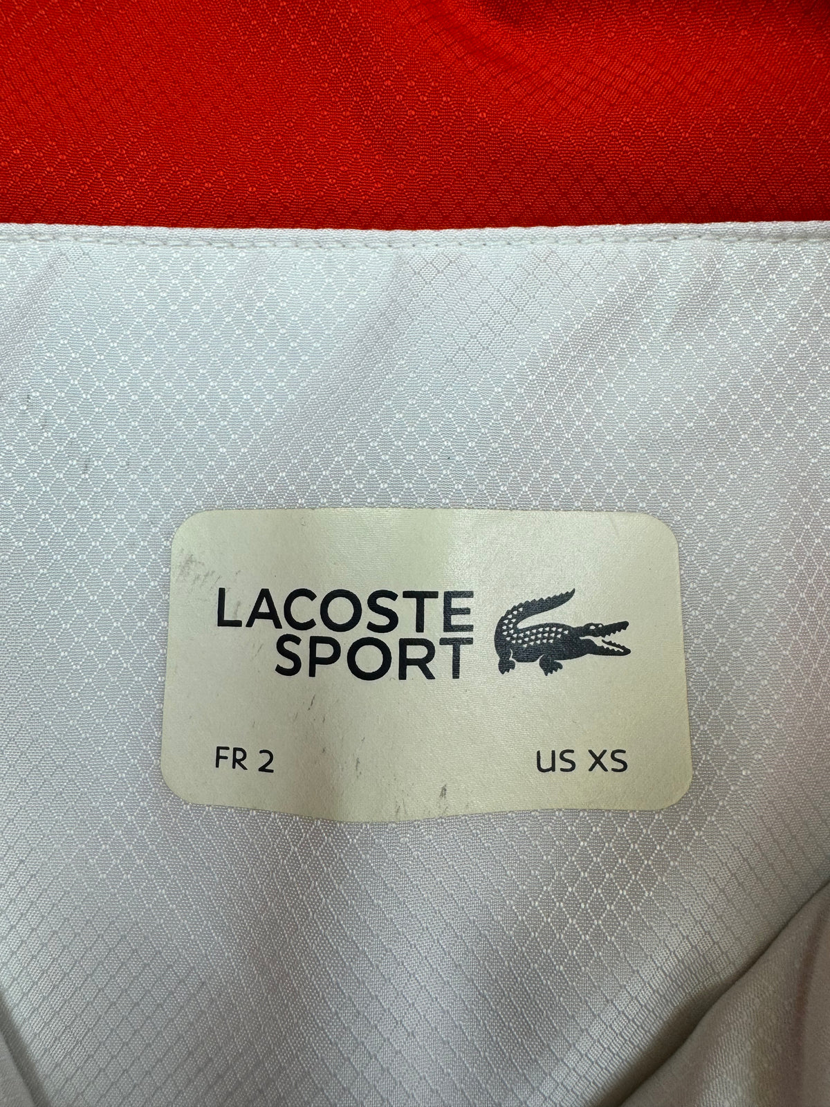 white Lacoste windbreaker {S}