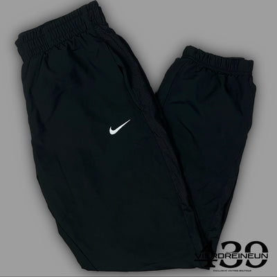 vintage Nike trackpants {M}