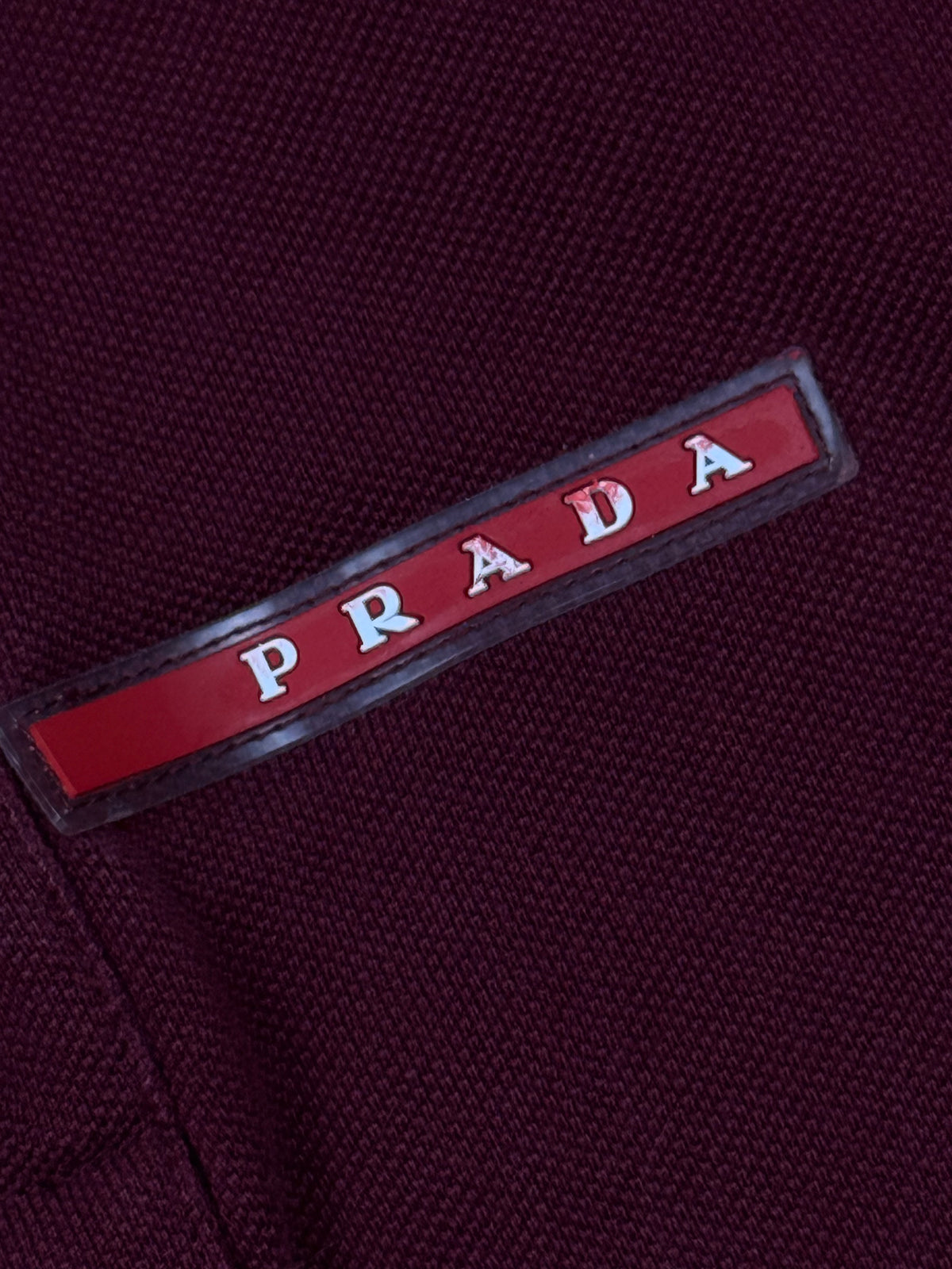 burgundy Prada polo {M}