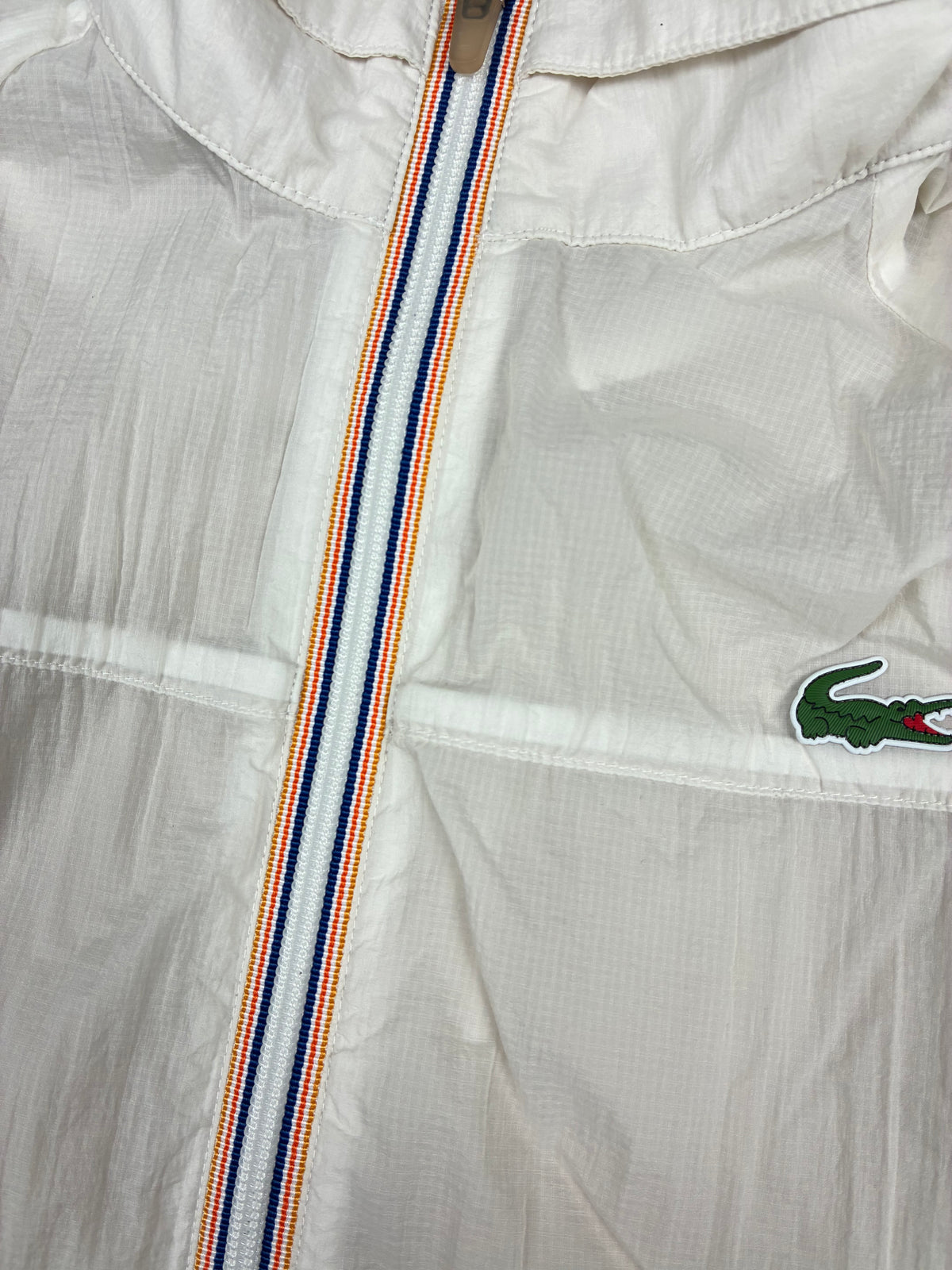 white Lacoste windbreaker {L}