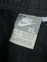 Load image into Gallery viewer, vintage Nike trackpants {S}
