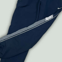 Load image into Gallery viewer, vintage Nike trackpants {M}
