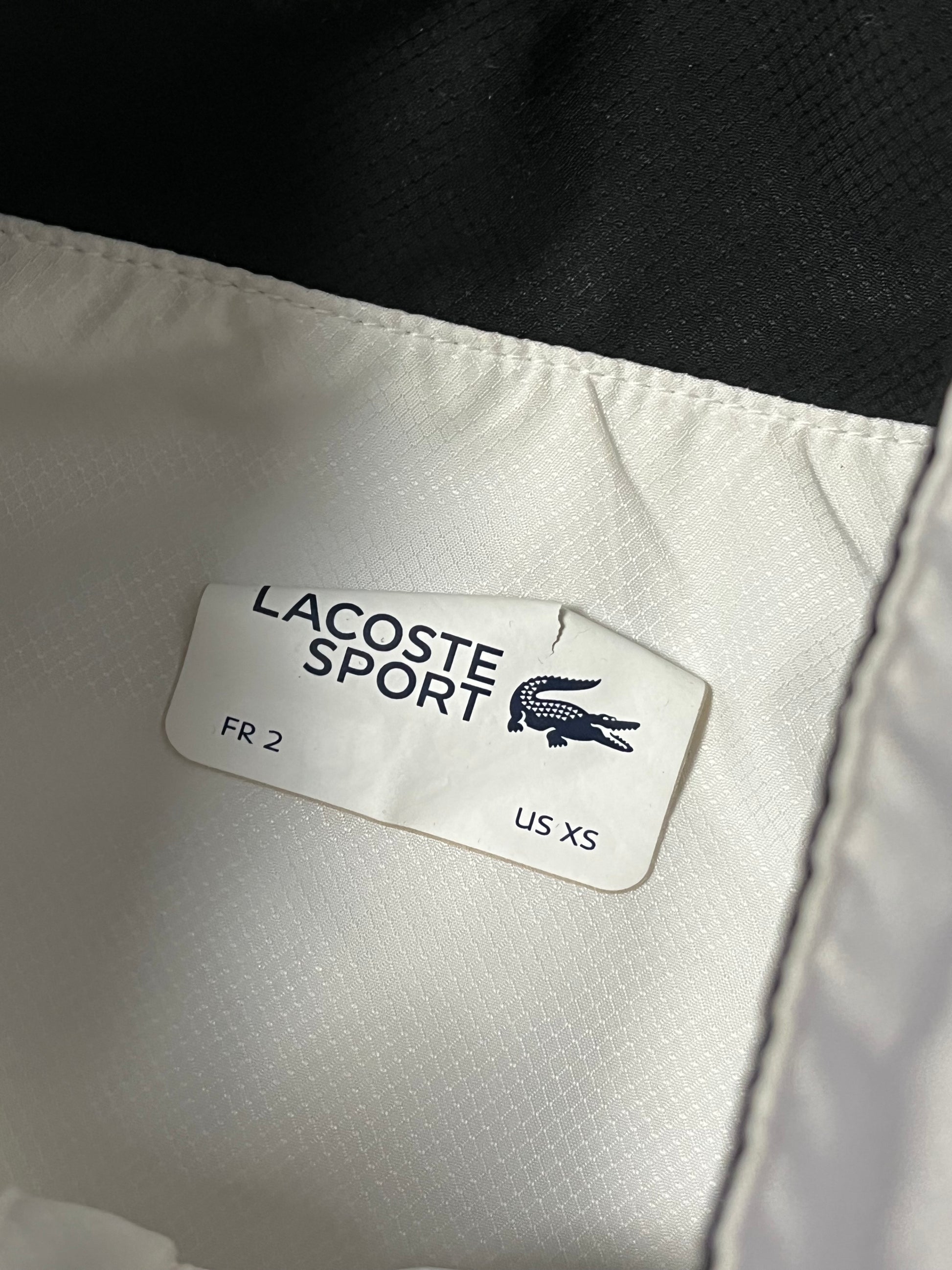 white Lacoste windbreaker {S}