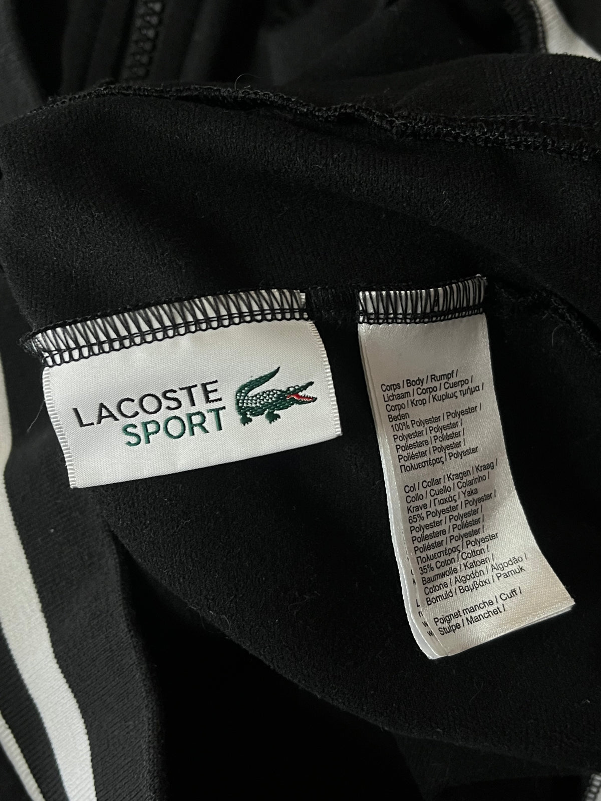 black Lacoste trackjacket {L}